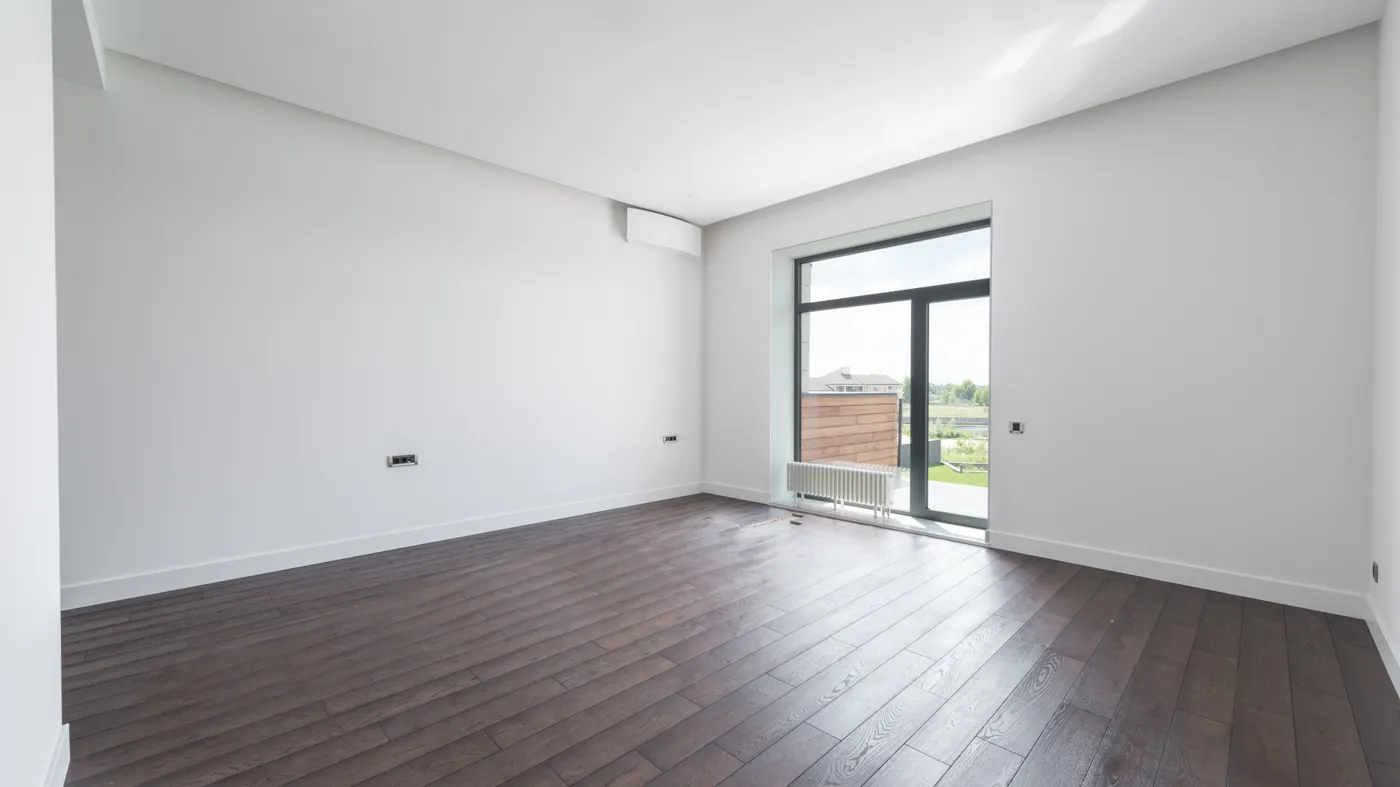 A sunlit empty room inside an inherited Texas home ready for a fast cash sale