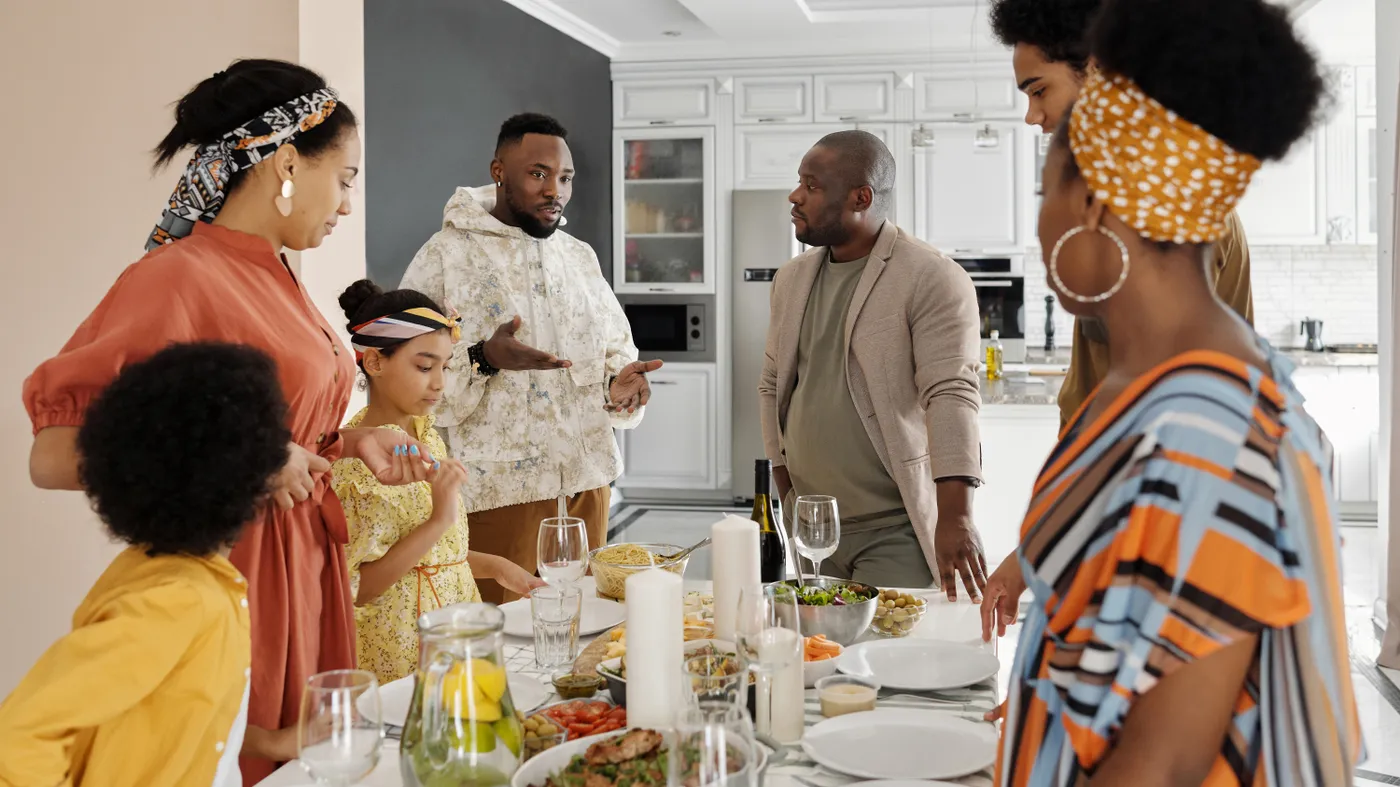 A family discussing whether to sell an inherited home, the kind of multiple-heir decision a fast cash sale simplifies
